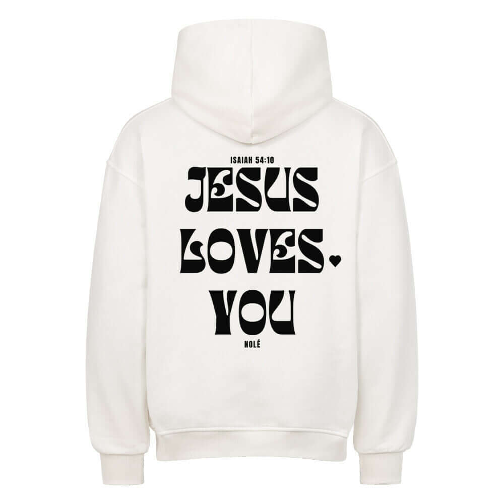 Back view of a white oversized hoodie with 'JESUS LOVES YOU' printed in bold black letters, showcasing stylish streetwear.