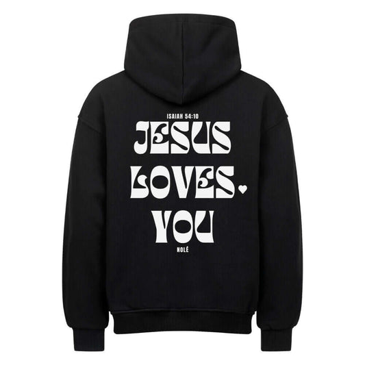 Black oversized hoodie with 'JESUS LOVES YOU' text and hood, made of heavy cotton.