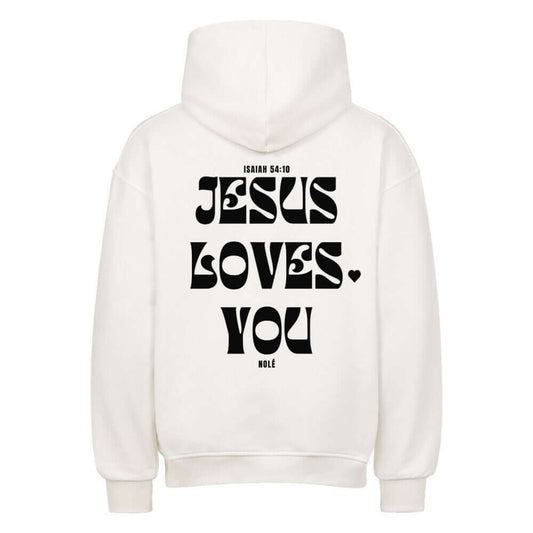 Back view of a white oversized hoodie with 'JESUS LOVES YOU' printed in bold black letters, showcasing stylish streetwear.